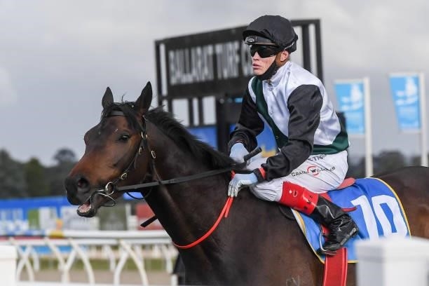 Craig Williams returns to the mounting yard on Mr Brightside after winning the Bet With Mates Cup at Sportsbet-Ballarat Racecourse on October 10,...
