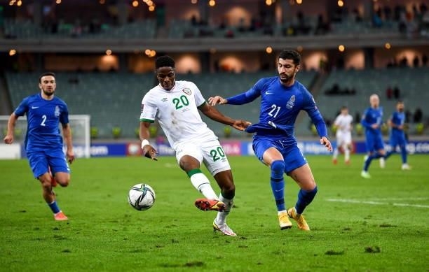 Baku , Azerbaijan - 9 October 2021; Chiedozie Ogbene of Republic of Ireland in action against Araz Abdullayev of Azerbaijan during the FIFA World Cup...