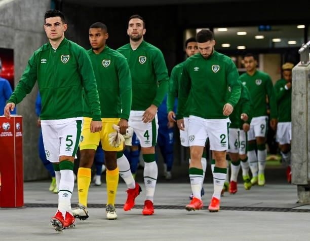 Baku , Azerbaijan - 9 October 2021; Republic of Ireland captain John Egan leads his side out before the FIFA World Cup 2022 qualifying group A match...