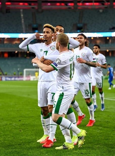 Baku , Azerbaijan - 9 October 2021; Callum Robinson of Republic of Ireland celebrates with team-mates after scoring their side's first goal during...