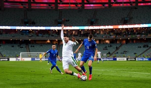Baku , Azerbaijan - 9 October 2021; Matt Doherty of Republic of Ireland in action against Anton Krivotsyuk of Azerbaijan during the FIFA World Cup...