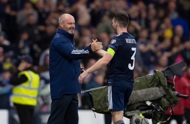 Steve Clarke and Andrew Robertson after a FIFA World Cup Qualifier between Scotland and Israel at Hampden Park, on October 09 in Glasgow, Scotland.