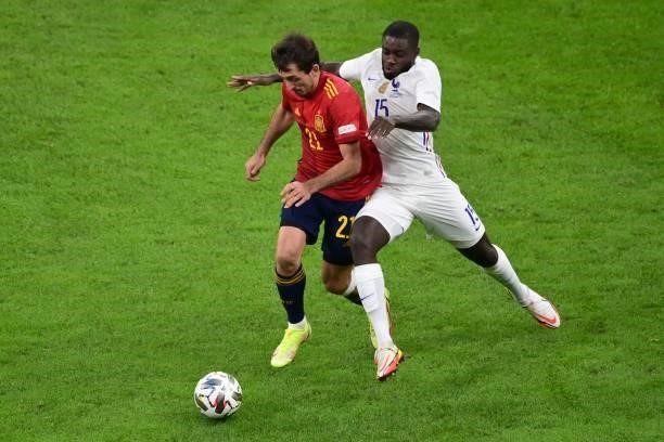 Spain's forward Mikel Oyarzabal vies with France's midfielder Dayot Upamecano during the Nations League final football match between Spain and France...