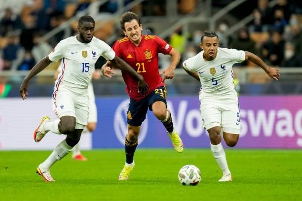 Dayot Upamecano of France, Mikel Oyarzabal of Spain and Jules Kounde of France battle for the ball during the UEFA Nations League Final match between...