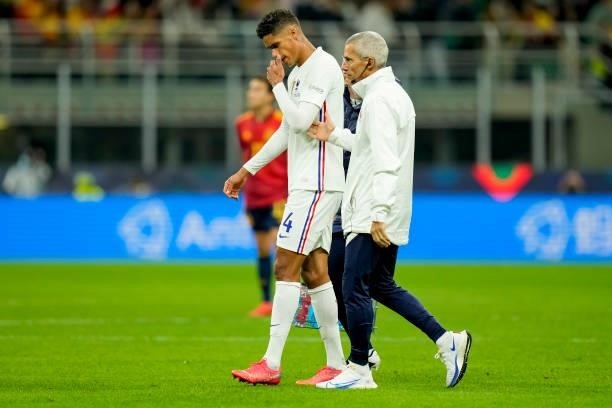 Raphael Varane of France receives medical treatment during the UEFA Nations League Final match between the Spain and France at San Siro Stadium on...