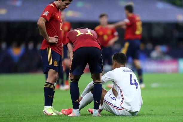 Raphael Varane of France injured during the UEFA Nations League Final match between the Spain and France at San Siro Stadium on October 10, 2021 in...