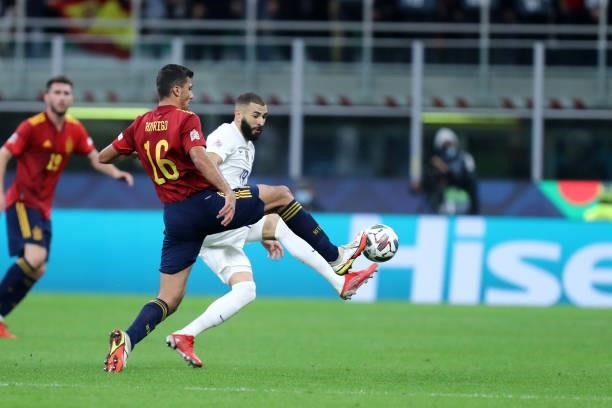 Karim Benzema of France and Rodri Hernandez of Spain battle for the ball during the UEFA Nations League Final match between the Spain and France at...