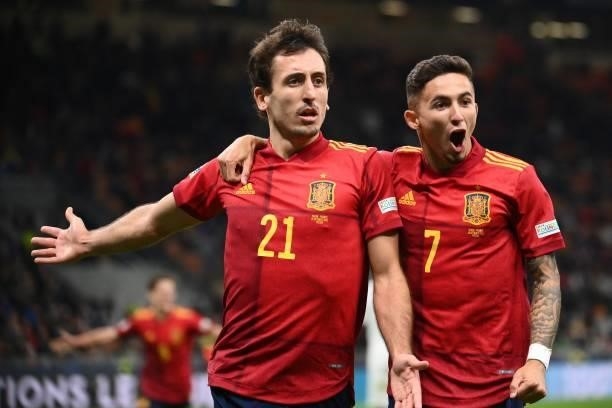 Spain's forward Mikel Oyarzabal celebrates with Spain's forward Yeremi Pino after scoring a goal during the Nations League final football match...