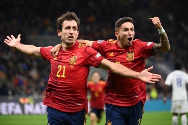 Spain's forward Mikel Oyarzabal celebrates with Spain's forward Yeremi Pino after scoring a goal during the Nations League final football match...