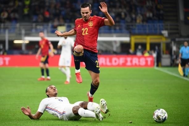 France's defender Jules Kounde vies with Spain's forward Pablo Sarabia during the Nations League final football match between Spain and France at San...