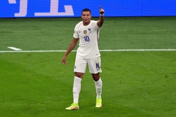 France's forward Kylian Mbappe celebrates after scoring a goal during the Nations League final football match between Spain and France at San Siro...