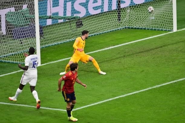 France's goalkeeper Hugo Lloris concedes a goal during the Nations League final football match between Spain and France at San Siro stadium in Milan,...