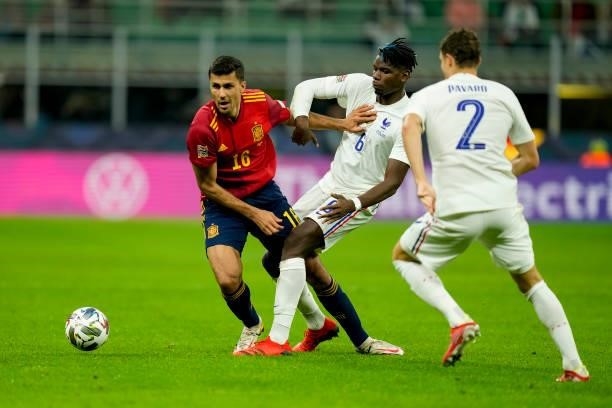 Rodri of Spain, Paul Pogba of France and Benjamin Pavard of France battle for the ball during the UEFA Nations League Final match between the Spain...