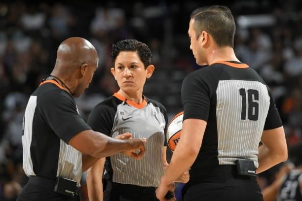 Officials talk during the Phoenix Mercury game against the Chicago Sky during Game One of the 2021 WNBA Finals on October 10, 2021 at Footprint in...