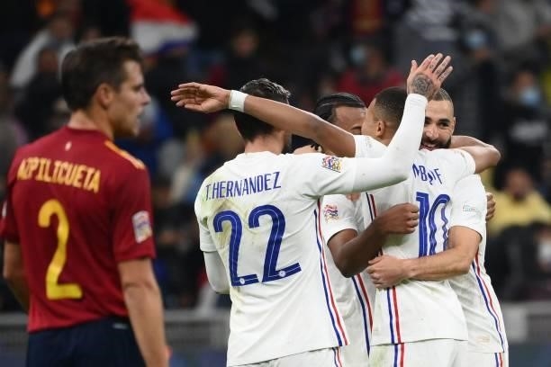 French players celebrate their victory at the end of the Nations League final football match between Spain and France at San Siro stadium in Milan,...
