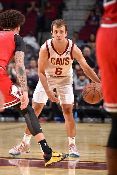 Kevin Pangos of the Cleveland Cavaliers handles the ball during a preseason game against the Chicago Bulls on October 10, 2021 at Rocket Mortgage...