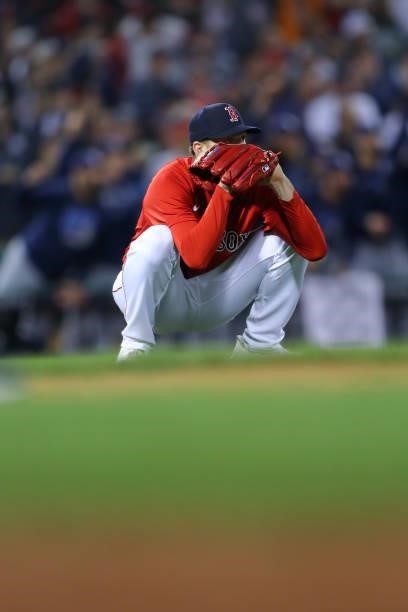 Nick Pivetta of the Boston Red Sox waits during a challenge to the call on the field in the 13th inning during Game 3 of the ALDS between the Tampa...