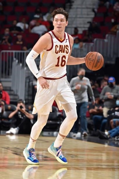Cedi Osman of the Cleveland Cavaliers dribbles the ball during a preseason game against the Chicago Bulls on October 10, 2021 at Rocket Mortgage...