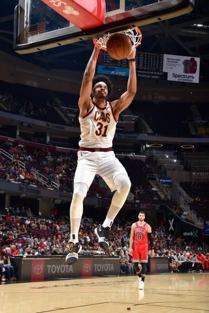 Jarrett Allen of the Cleveland Cavaliers dunks the ball during a preseason game against the Chicago Bulls on October 10, 2021 at Rocket Mortgage...