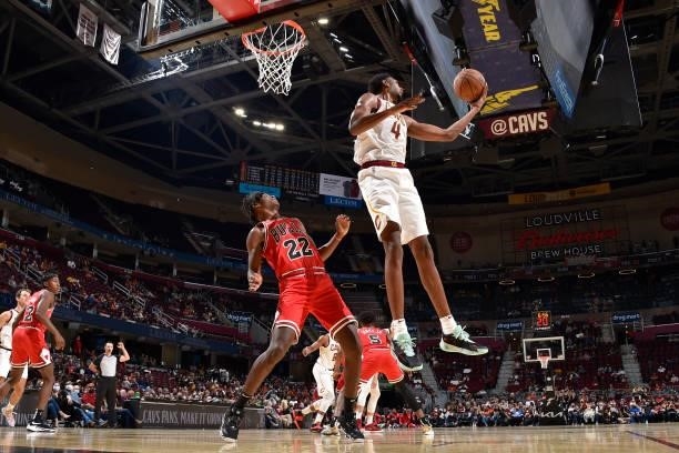 Evan Mobley of the Cleveland Cavaliers catches the rebound during a preseason game against the Chicago Bulls on October 10, 2021 at Rocket Mortgage...