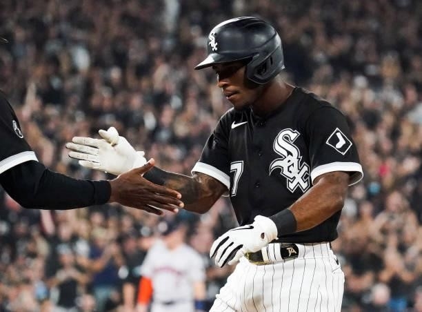 Tim Anderson of the Chicago White Sox reacts after hitting a single in the first inning during Game 3 of the ALDS between the Houston Astros and the...