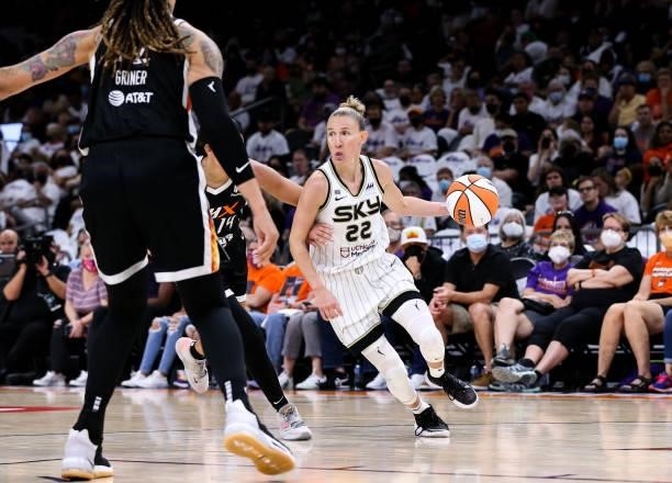 Courtney Vandersloot of the Chicago Sky drives against Bria Hartley of the Phoenix Mercury and Brittney Griner of the Phoenix Mercury in the second...