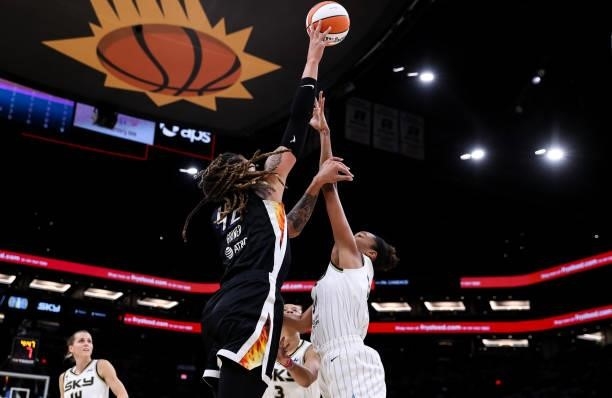 Brittney Griner of the Phoenix Mercury shoots over Azurá Stevens of the Chicago Sky in the first half at Footprint Center on October 10, 2021 in...