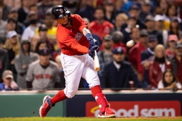 Christian Vazquez of the Boston Red Sox hits a game winning walk-off two run home run during the thirteenth inning of game three of the 2021 American...