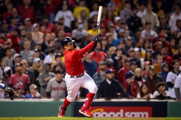 Christian Vazquez of the Boston Red Sox hits a game winning walk-off two run home run during the thirteenth inning of game three of the 2021 American...