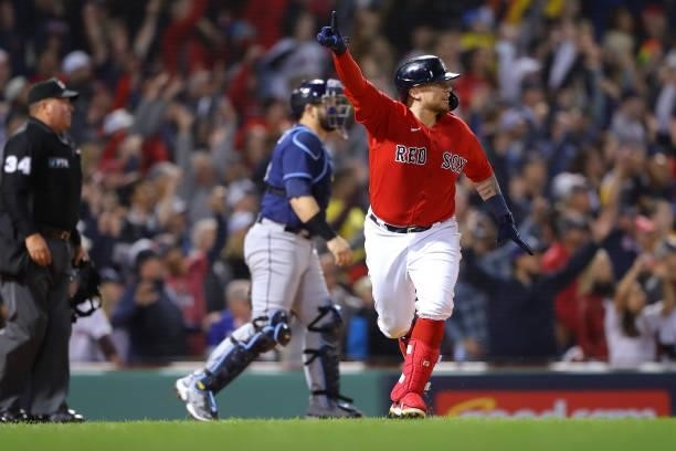 Christian Vázquez of the Boston Red Sox reacts after hitting a walk-off home run in the 13th inning during Game 3 of the ALDS between the Tampa Bay...