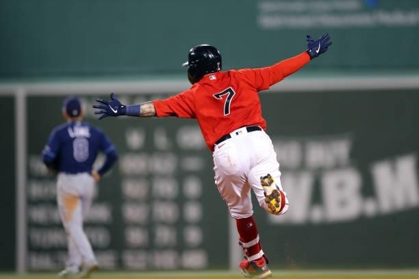Christian Vázquez of the Boston Red Sox rounds the bases after hitting a walk-off home run in the 13th inning during Game 3 of the ALDS between the...