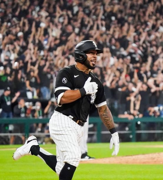 Leury Garcia of the Chicago White Sox reacts after hitting a three run home run in the third inning during Game 3 of the ALDS between the Houston...