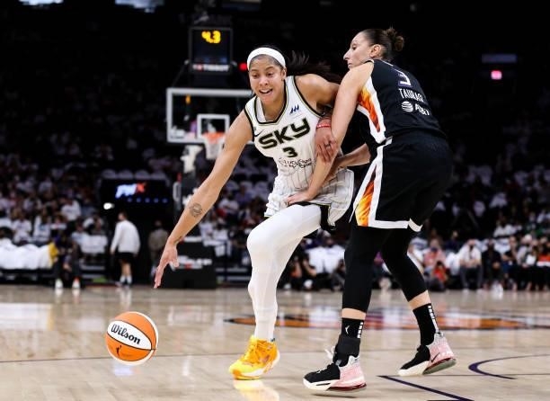 Candace Parker of the Chicago Sky drives to the basket against Diana Taurasi of the Phoenix Mercury in the second half at Footprint Center on October...