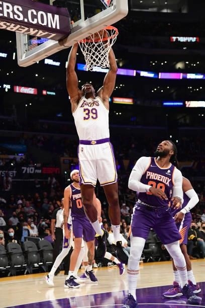 Dwight Howard of the Los Angeles Lakers dunks the ball during a preseason game against the Phoenix Suns on October 10, 2021 at STAPLES Center in Los...