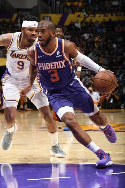 Chris Paul of the Phoenix Suns drives to the basket during a preseason game against the Los Angeles Lakers on October 10, 2021 at STAPLES Center in...