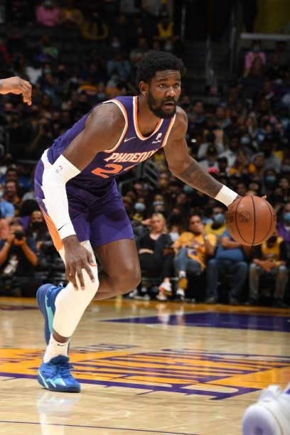 Deandre Ayton of the Phoenix Suns handles the ball during a preseason game against the Los Angeles Lakers on October 10, 2021 at STAPLES Center in...