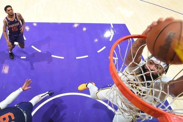 Anthony Davis of the Los Angeles Lakers dunks the ball during a preseason game against the Phoenix Suns on October 10, 2021 at STAPLES Center in Los...