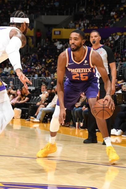 Mikal Bridges of the Phoenix Suns handles the ball during a preseason game against the Los Angeles Lakers on October 10, 2021 at STAPLES Center in...