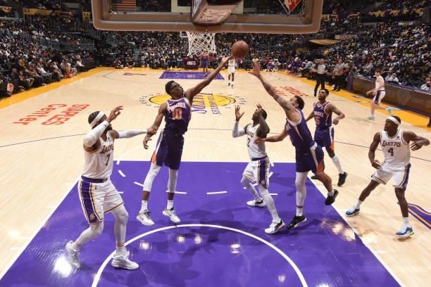 Jalen Smith of the Phoenix Suns catches the rebound during a preseason game against the Los Angeles Lakers on October 10, 2021 at STAPLES Center in...