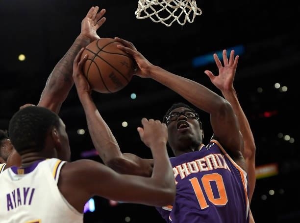 Jalen Smith of the Phoenix Suns goes for a basket against Joel Ayayi of the Los Angeles Lakers during the second half of a preseason game at Staples...