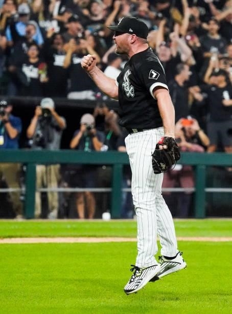Liam Hendriks of the Chicago White Sox reacts after recording the final out to defeat the Houston Astros 12-6 in Game 3 of the ALDS between...
