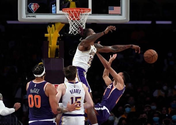 Dwight Howard of the Los Angeles Lakers blocks a layup by Landry Shamet of the Phoenix Suns during the second half of preseason game against at...