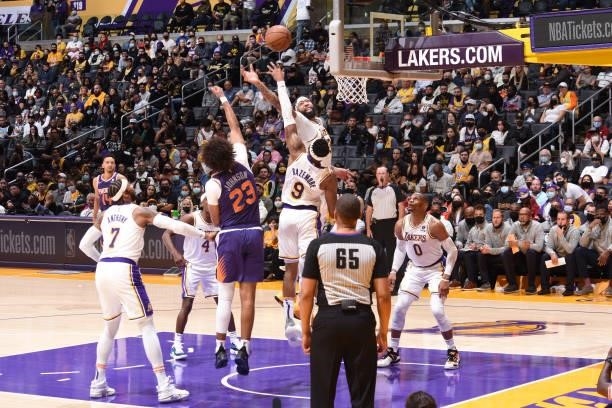Anthony Davis of the Los Angeles Lakers reaches for the rebound during a preseason game against the Phoenix Suns on October 10, 2021 at STAPLES...