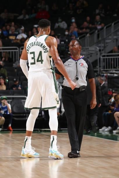 Referee, James Capers talks to a player during a preseason game between the Milwaukee Bucks and the Oklahoma City Thunder on October 10, 2021 at the...