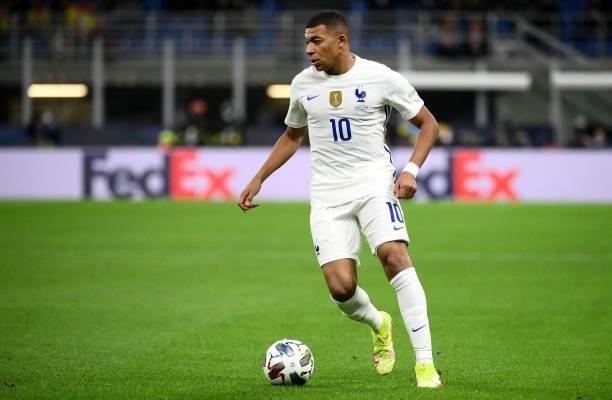 France's forward Kylian Mbappe plays the ball during the Nations League final football match between Spain and France at San Siro stadium in Milan,...