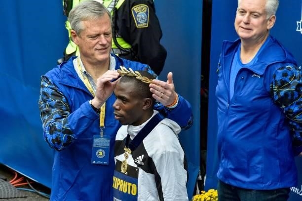 Benson Kipruto of Kenya is honored for taking first place in the professional mens division during the 125th Boston Marathon in Boston, Massachusetts...