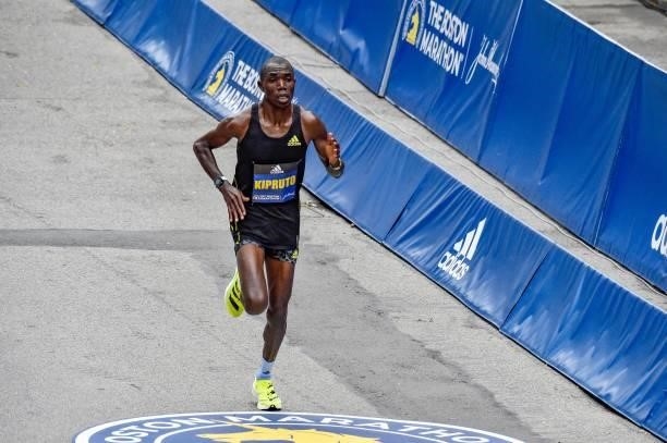 Benson Kipruto of Kenya runs to the finish line to take first place in the professional mens division during the 125th Boston Marathon in Boston,...