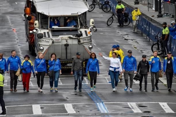 Grand Marshals of the race parade by the finish line during the 125th Boston Marathon in Boston, Massachusetts on October 11, 2021.
