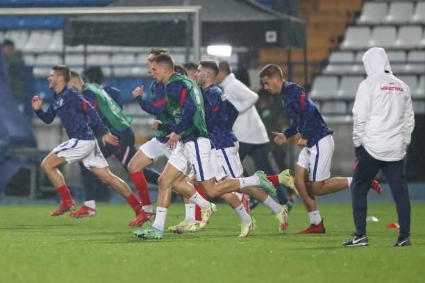 The Croatia squad warm up prior to the 2022 FIFA World Cup Group H Qualifier match between Croatia and Slovakia at Gradski Vrt Stadium on October 11,...