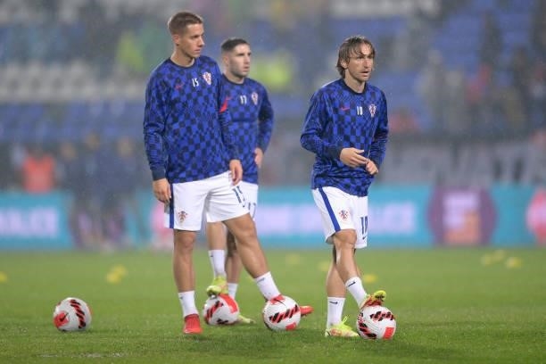 Luka Modric of Croatia, Mario Pasalic of Croatia and Luka Ivanusec of Croatia warm up prior during the 2022 FIFA World Cup Group H Qualifier match...